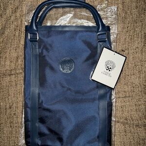 Vince Camuto blue nylon duffel bag.